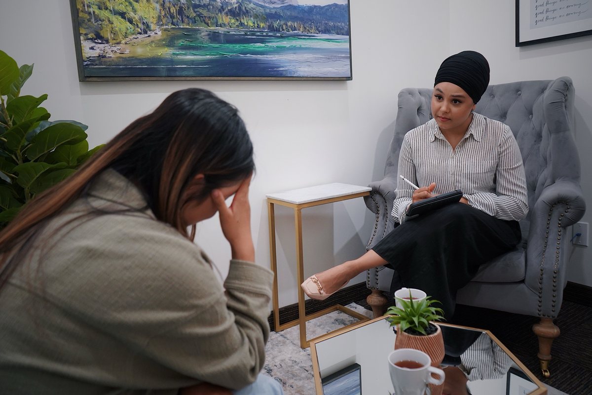 A psychologist listening during a counselling session