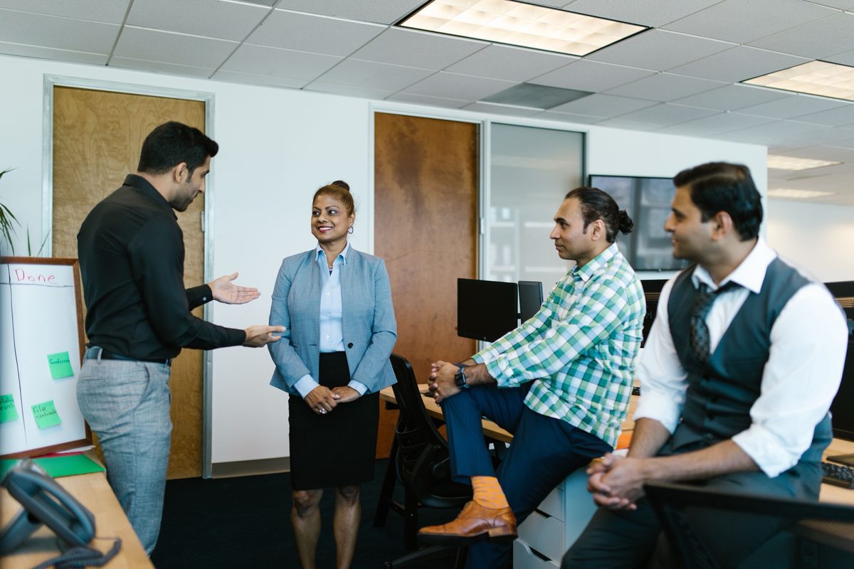 A workplace team in conversation